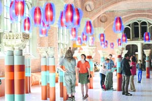 Visitors look at an installation by Cuban-American artist Jorge Pardo in the Augustins Museum in Toulouse, southern France, incorporating the museum’s collection of Norman column tops, as part of Toulouse’s International Art Festival