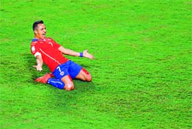 Chiles Alexis Sanchez celebrates his goal against Australia during their Group B match at the Pantanal arena in Cuiaba