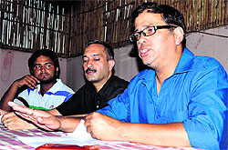 Members of Dhaad, an NGO, address a press conference 
