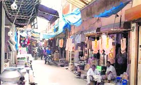 Shops open in a market of Tauru on Sunday