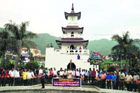 Residents pay homage to the Beas tragedy victims in Mandi on Saturday evening