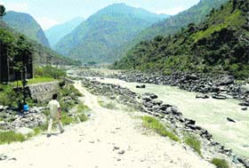 A file photo of a road being dug up illegally along the Beas