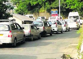 Cars queue up near the lift in Shimla