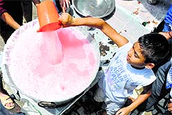Sweetened water being prepared in Jammu on Sunday