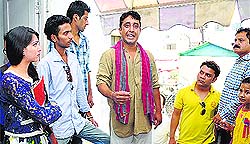 A scene from a Hindi plays Maa Mujhe Tagore Bana De at Natrang Studio Theatre in Jammu on Sunday
