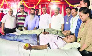 Donors donate blood during a blood donation camp organised by Zindagi Live Foundation in Ludhiana. 