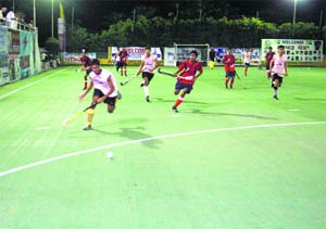 Players in action during a match of the Fifth Olympian Prithipal Singh Hockey Festival at Jarkhar village.
