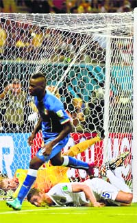 Mario Balotelli (front) makes his exit after leaving England in tatters at the Amazonia Arena in Manaus. 