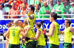 Australias Kieran Govers celebrates a goal against Netherlands during their final of the mens Hockey World Cup in The Hague on Sunday