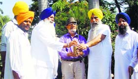 Members of Takht Sri Damdama Sahib inaugurate the plantation drive initiated by Amritsar-based NGO Khuda-i-Khidmadgaran volunteers at Talwandi Sabo.