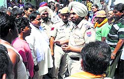 Police enquire about the incident where a two and half year old child was killed at Ghanahia Nagar in Bathinda on Monday