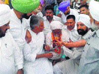 Congress MLAs offer juice to BC Premi in Mohali on Monday.