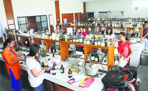 Students work at a laboratory of the Science Department at Panjab University in Chandigarh.