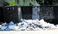 rISKING LIVES: Used thermocol plates dumped on the roadside in Una. 
