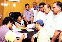 Industrialists enrol themselves for the social security scheme in Jalandhar on Monday.