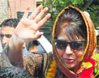 PDP president Mehbooba Mufti during a road show in Kulgam district on Monday.