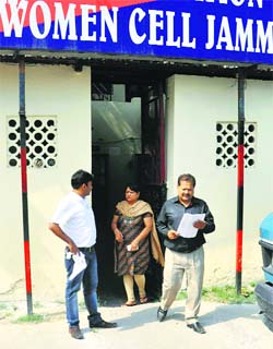 Family members of dowry victim Ritu Jain come out of the Women Cell police station after making a complaint against her husband and in-laws in Jammu.