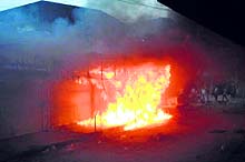 A confectionary shop engulfed in fire in Abohar on Monday