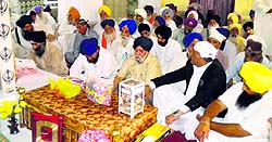 Former DSGMC chief Paramjit Singh Sarna and other members of the Sikh jatha at Gurdwara Dehra Sahib in Lahore on Monday on the occasion of martyrdom day of Guru Arjan Dev