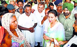 Former Union Minister of State Preneet Kaur with Congress workers at a meeting in Rajpura on Monday