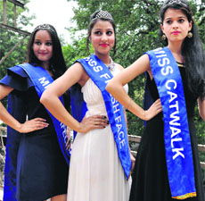 Participants pose for the Uttarakhand Prince and Queen competition in Dehradun on Tuesday.