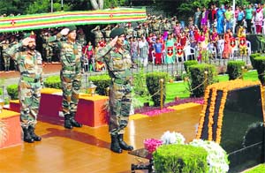 Northern Command chief Lt Gen DS Hooda pays homage at the Dhruva War Memorial in Udhampur on Tuesday