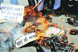 BJP activists protest against controversial remarks of Chief Minister Omar Abdullah in Jammu on Tuesday. 