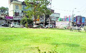 A park in the Model Town area is being converted into a parking lot.
