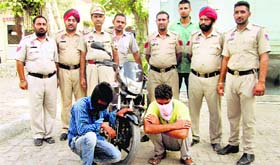 The accused in police custody.