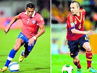 Chiles Alexis Sanchez (left) and Spains Andres Iniesta will both play a crucial role when the teams slug it out on Wednesday
