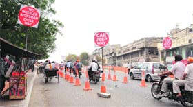 To streamline the traffic on the busy Bhandari Bridge, the traffic police have made separate lanes for two-wheelers and four-wheelers in Amritsar on Wednesday.