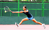 A player in action during the All-India Super Series Tennis Tournament at the Shanti Tennis Academy in Dehradun on Wednesday.