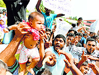 Sri Lankan Muslims protest against radical Buddhist group Bodu Bala Sena at a makeshift camp in Beruwala near Colombo on Wednesday.