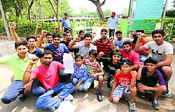 Rowers of the Punjab Rowing Association protest outside the Lake Sports Complex in Chandigarh on Thursday