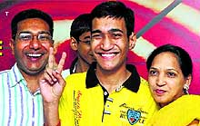 Prashant Mittal celebrates success in the JEE (Advanced) with his parents in Chandigarh on Thursday