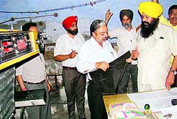 Punjab Jail, Tourism, Cultural Affairs and Printing and Stationery Minister Sohan Singh Thandal during a surprise check at Government Printing Press, Mohali, on Thursday