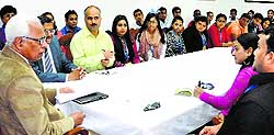 Governor NN Vohra interacts with a group of overseas youth at Raj Bhawan in Srinagar on Thursday