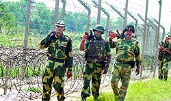 BSF personnel patrol along the border