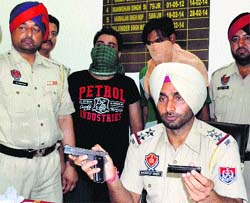 The accused in police custody in Jalandhar on Thursday.  