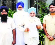 Sham Singh Harika with members of his NGO in Ludhiana.