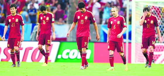 (L-R) Spains David Silva, Sergio Busquets, Diego Costa, Andres Iniesta and Xabi Alonso wilted under the burden of expectations in Brazil.