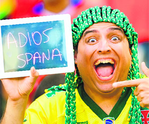 A Chilean fan gives a kick in the teeth to the World No. 1 team by giving the marching orders.