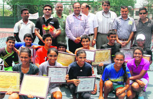 The winners of the All India Super Series Tennis Tournament in Dehradun on Friday. 