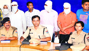 SSP Sadanand Date, ASP Surjeet Pawar and trainee IPS officer Tripti Bhatt with the accused in Haridwar on Friday.