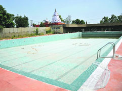 The Olympic-size swimming pool under renovation at Maulana Azad Sports Stadium in Jammu. 