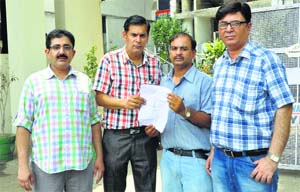 Members of the Ludhiana Retail Chemists Association submit a memorandum to Police Commissioner RK Jaiswal in Ludhiana.