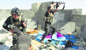 Iraqi soldiers take up positions in Ramadi on Friday.