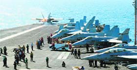 The US Navy launches off the flight deck of the aircraft carrier USS George HW Bush during flight operations in the Arabian Gulf. AFP 