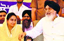 Chief Minister Parkash Singh Badal and his daughter-in-law and Union Minister Harsimrat Kaur in Lambi on Friday