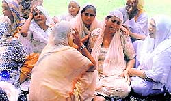 Wailing relatives of the deceased in Karia Pehalwaan village of Ferozepur on Friday